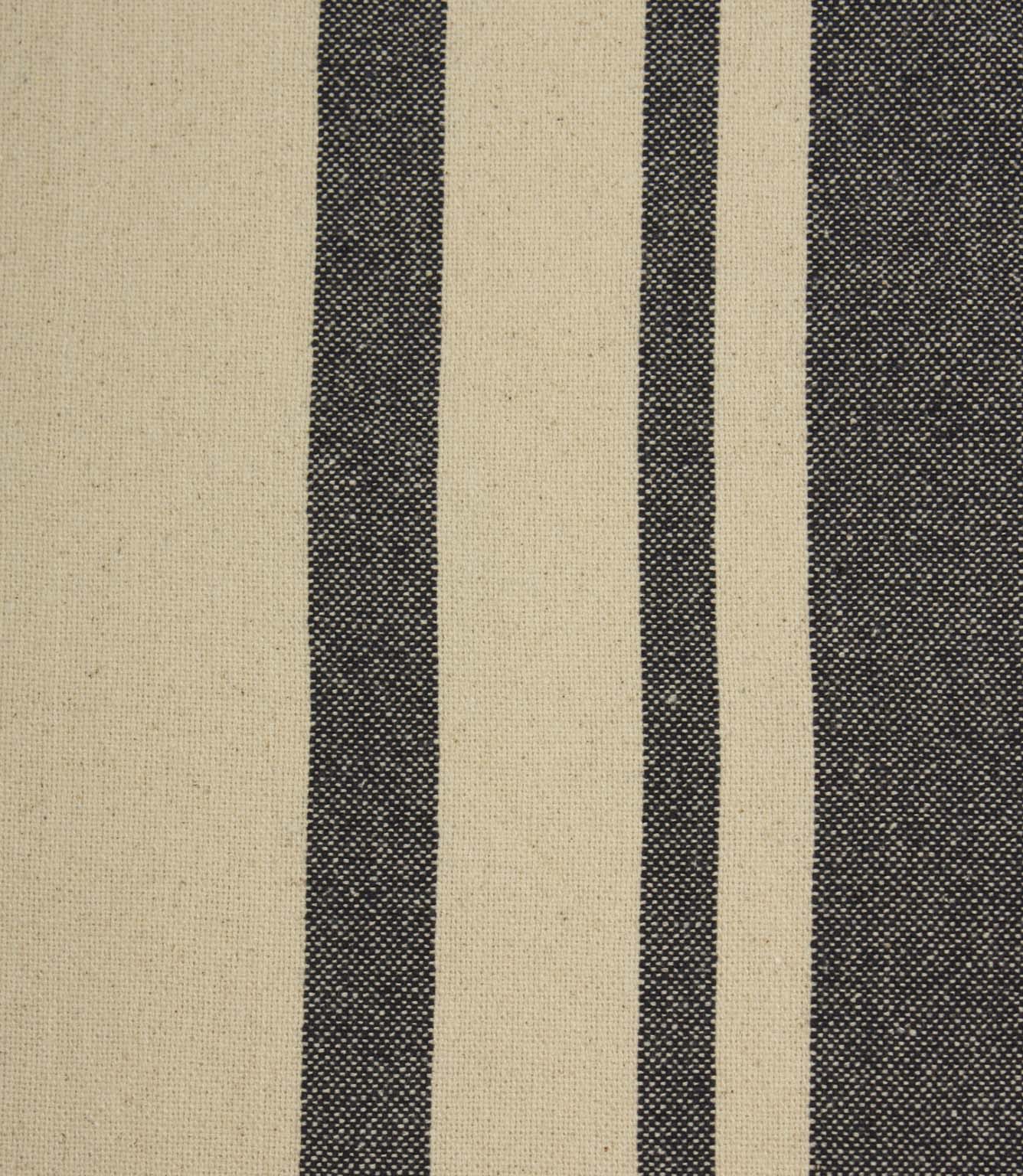 Close-up of charcoal and cream striped woven fabric showing the detailed weave and contrasting stripe pattern.