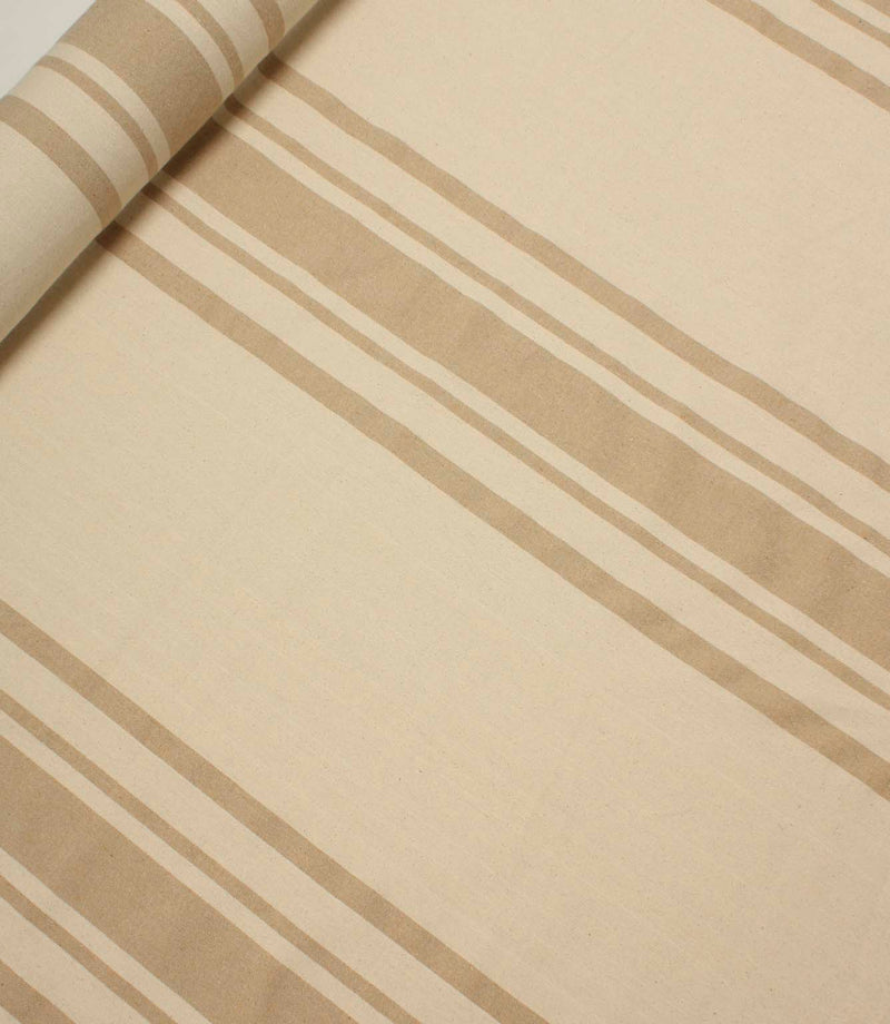 Rolled striped fabric in warm neutral tones with wide vertical stripe detailing.