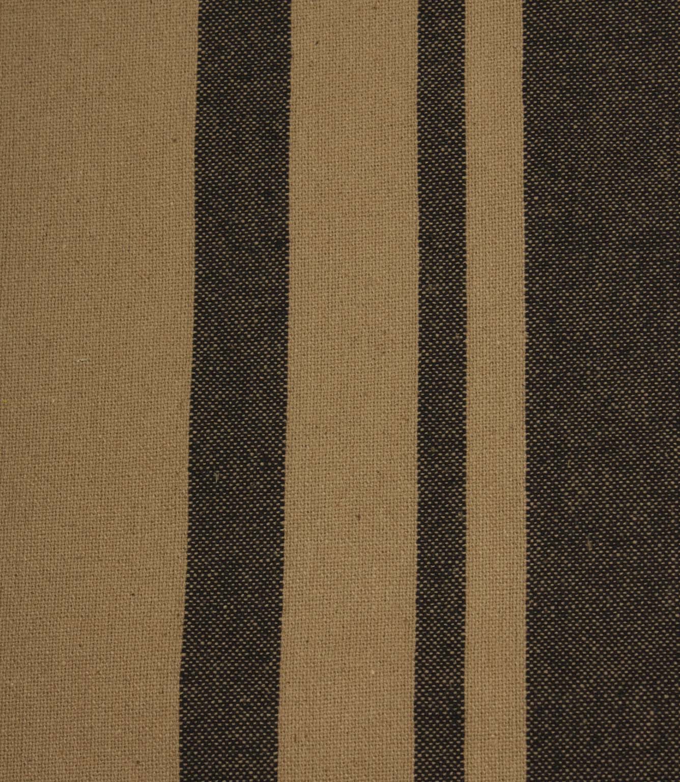 Close-up of black and camel striped woven fabric highlighting the detailed weave and contrasting stripe design.