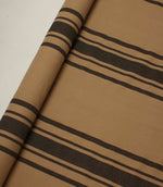 Black and camel striped fabric roll with bold stripe detailing, ideal for upholstery, curtains and interior décor projects.