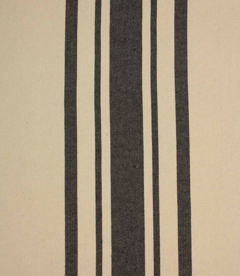 Cream and black striped woven fabric with bold vertical stripes, suitable for curtains, upholstery and soft furnishing projects.