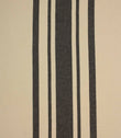 Cream and black striped woven fabric with bold vertical stripes, suitable for curtains, upholstery and soft furnishing projects.