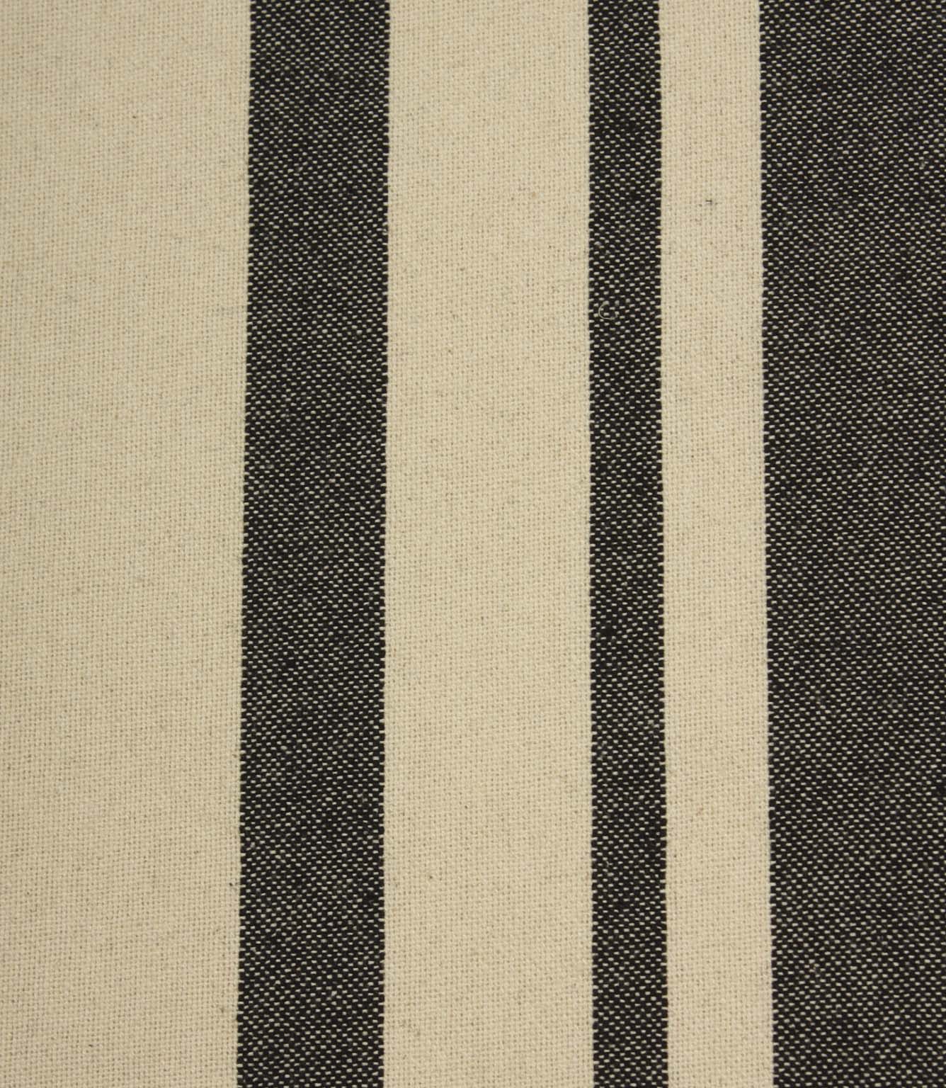 Close-up of cream striped fabric with contrasting black woven stripes and a textured natural-look finish.
