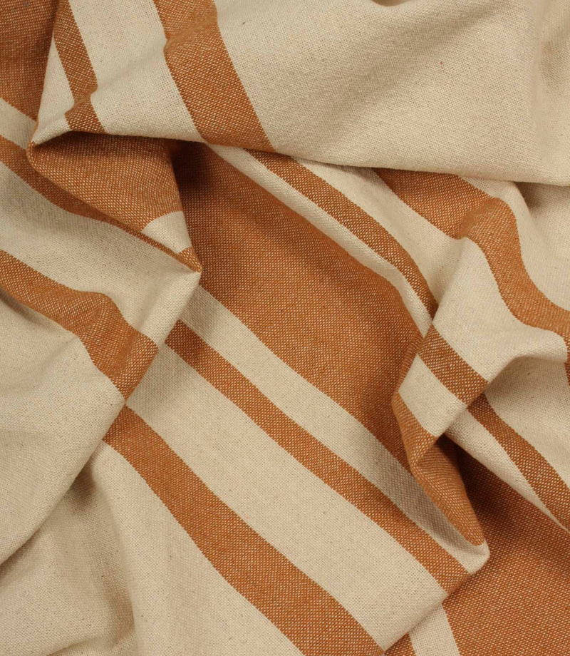 Detailed close-up of cream and terracotta woven stripe fabric showing the contrast and texture within the weave.