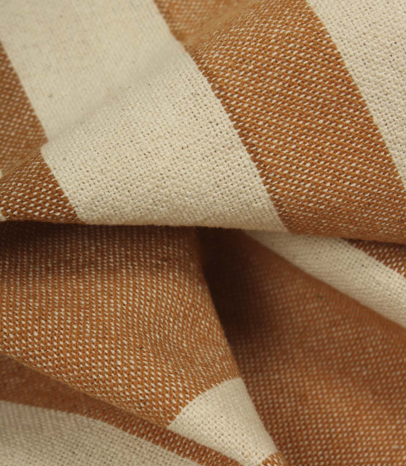 Rolled cream striped fabric with terracotta stripe detailing, suitable for upholstery, curtains and interior décor applications.