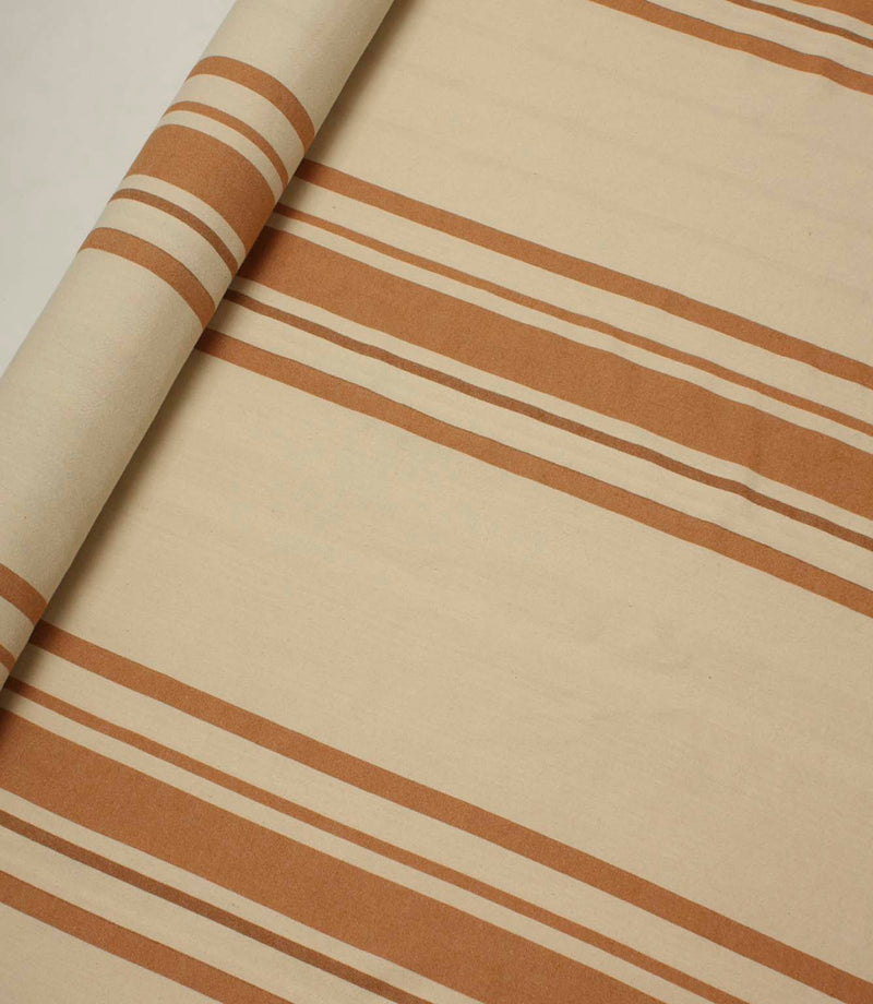 Rolled cream fabric with warm terracotta stripe detailing, shown flat to highlight the scale and spacing of the stripe pattern.