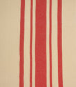 Cream and red striped woven fabric with bold vertical stripes and a natural textured finish, suitable for curtains and upholstery.
