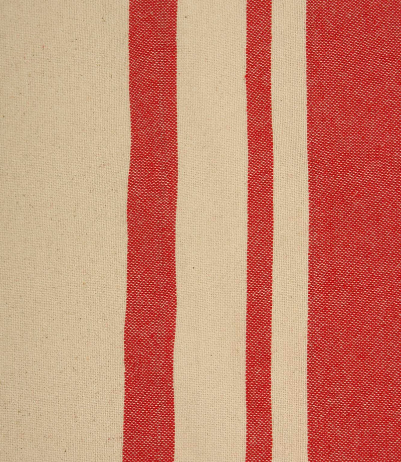 Close-up of cream fabric with vibrant red woven stripes highlighting the detailed texture and stripe spacing.
