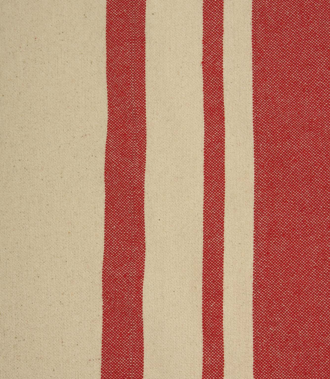 Close-up of cream fabric with vibrant red woven stripes highlighting the detailed texture and stripe spacing.