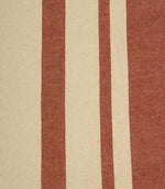 Close-up of cream fabric with muted terracotta woven stripes showing the detailed weave and classic stripe pattern.