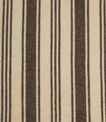 Close-up of cream fabric with dark brown woven stripes showing the fine texture and narrow stripe detailing.