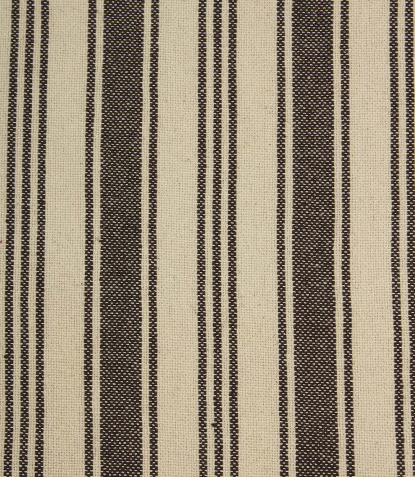 Close-up of cream fabric with dark brown woven stripes showing the fine texture and narrow stripe detailing.