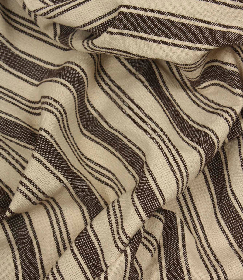 Gathered cream and dark brown striped fabric highlighting the relaxed drape and timeless woven stripe design.