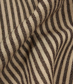 Rolled woven stripe fabric in neutral brown and cream with a classic narrow stripe pattern.
