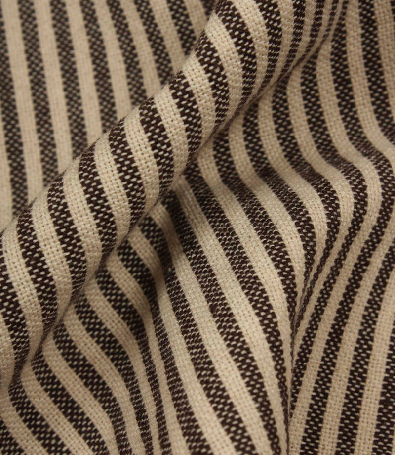 Rolled woven stripe fabric in neutral brown and cream with a classic narrow stripe pattern.
