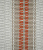 Close-up of Alma Stripe Terracotta fabric showing the textured weave with twin terracotta stripes set within a natural beige band on an off-white ground.