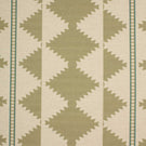 Patterned fabric with green geometric design on a beige background
