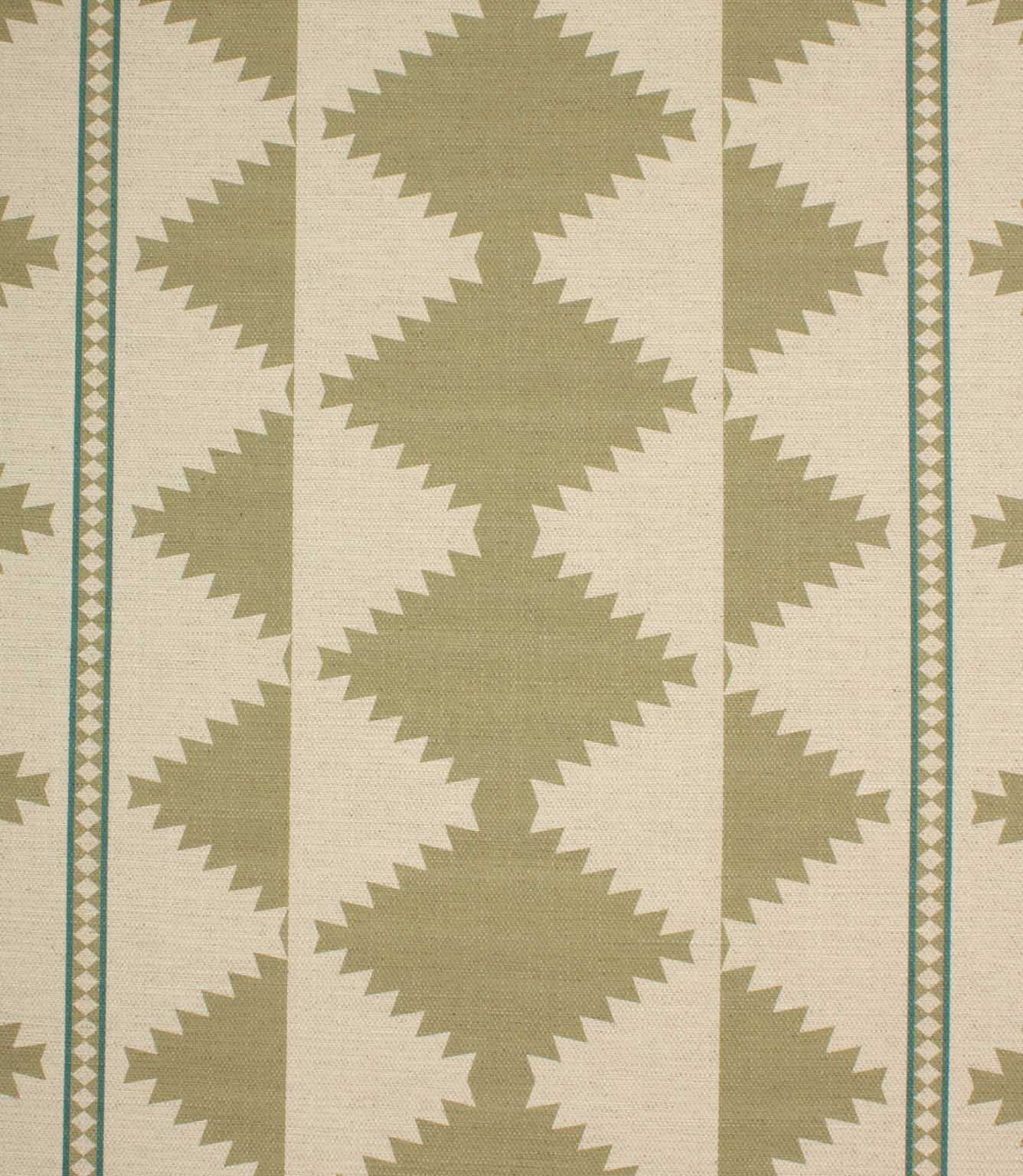 Patterned fabric with green geometric design on a beige background