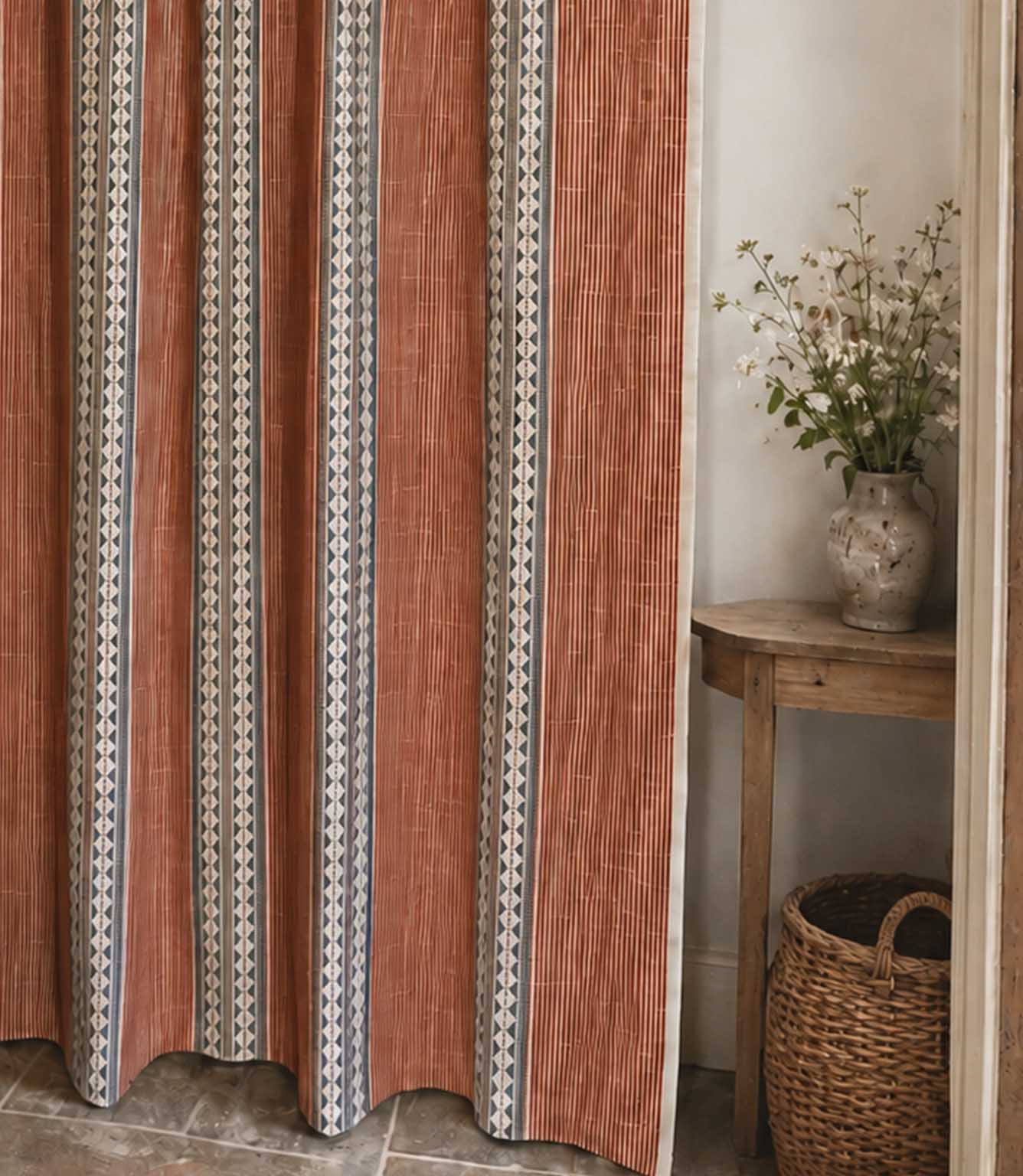 Striped curtain with a subtle geometric pattern fabric.