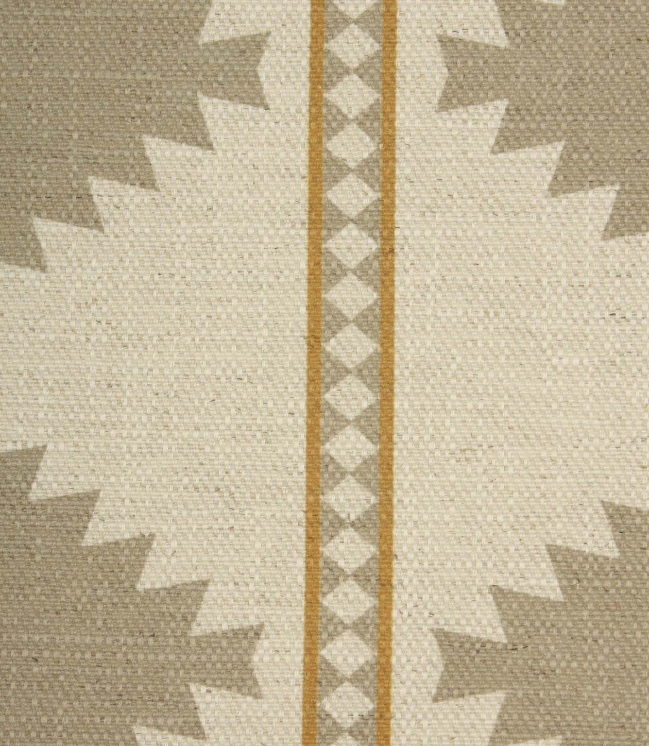 Close-up of textured cream fabric featuring taupe geometric motifs and decorative ochre striped borders with diamond detailing.