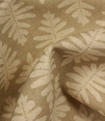 Close-up of Ashleaf Almond fabric showing woven texture and botanical pattern.