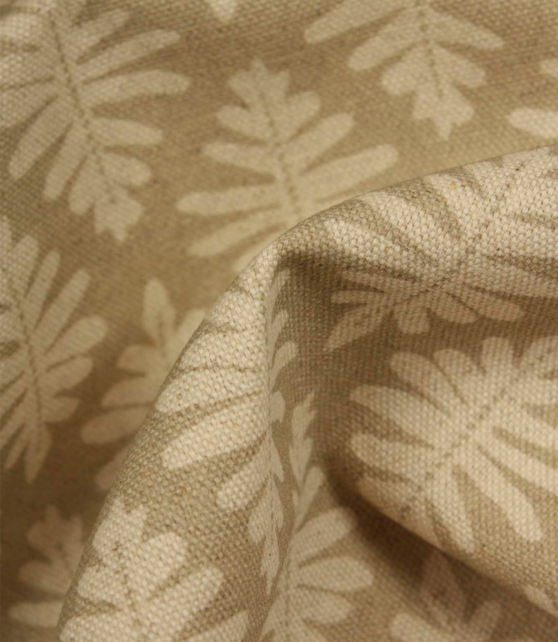 Close-up of Ashleaf Almond fabric showing woven texture and botanical pattern.