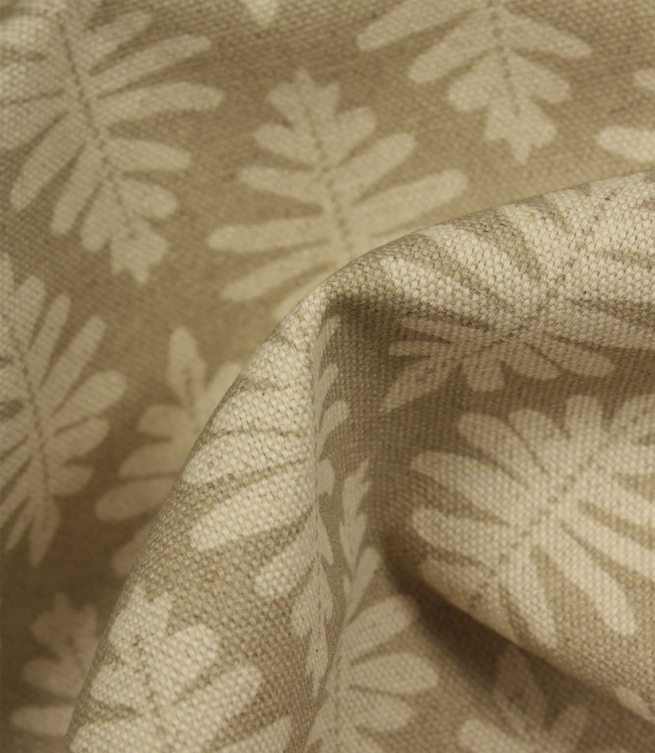Close-up of Ashleaf Almond fabric showing woven texture and botanical pattern.
