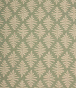 Close-up of Ashleaf Dill fabric showcasing the woven texture and stylised cream leaf design.