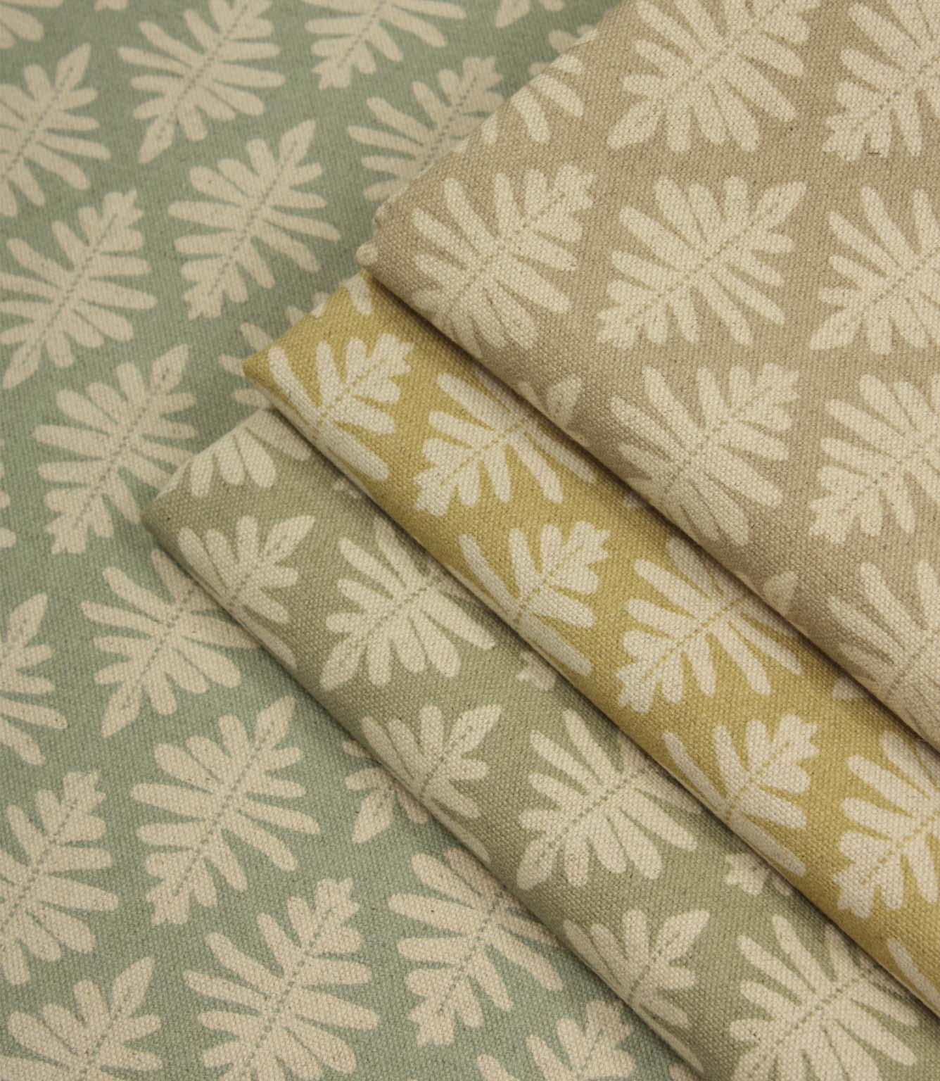 Ashleaf fabric collection shown in Almond, green and yellow colourways.