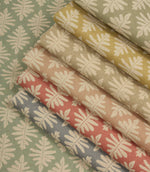 Ashleaf fabric collection featuring multiple colourways, showcasing the small-scale woven foliage design across coordinating contemporary shades suitable for curtains, blinds, cushions and upholstery.