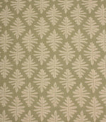 Close-up of Ashleaf Lemon Grass fabric showcasing the woven texture and contemporary leaf motif.