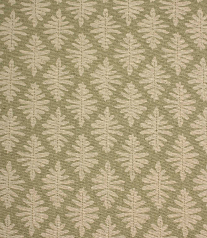 Close-up of Ashleaf Lemon Grass fabric showcasing the woven texture and contemporary leaf motif.
