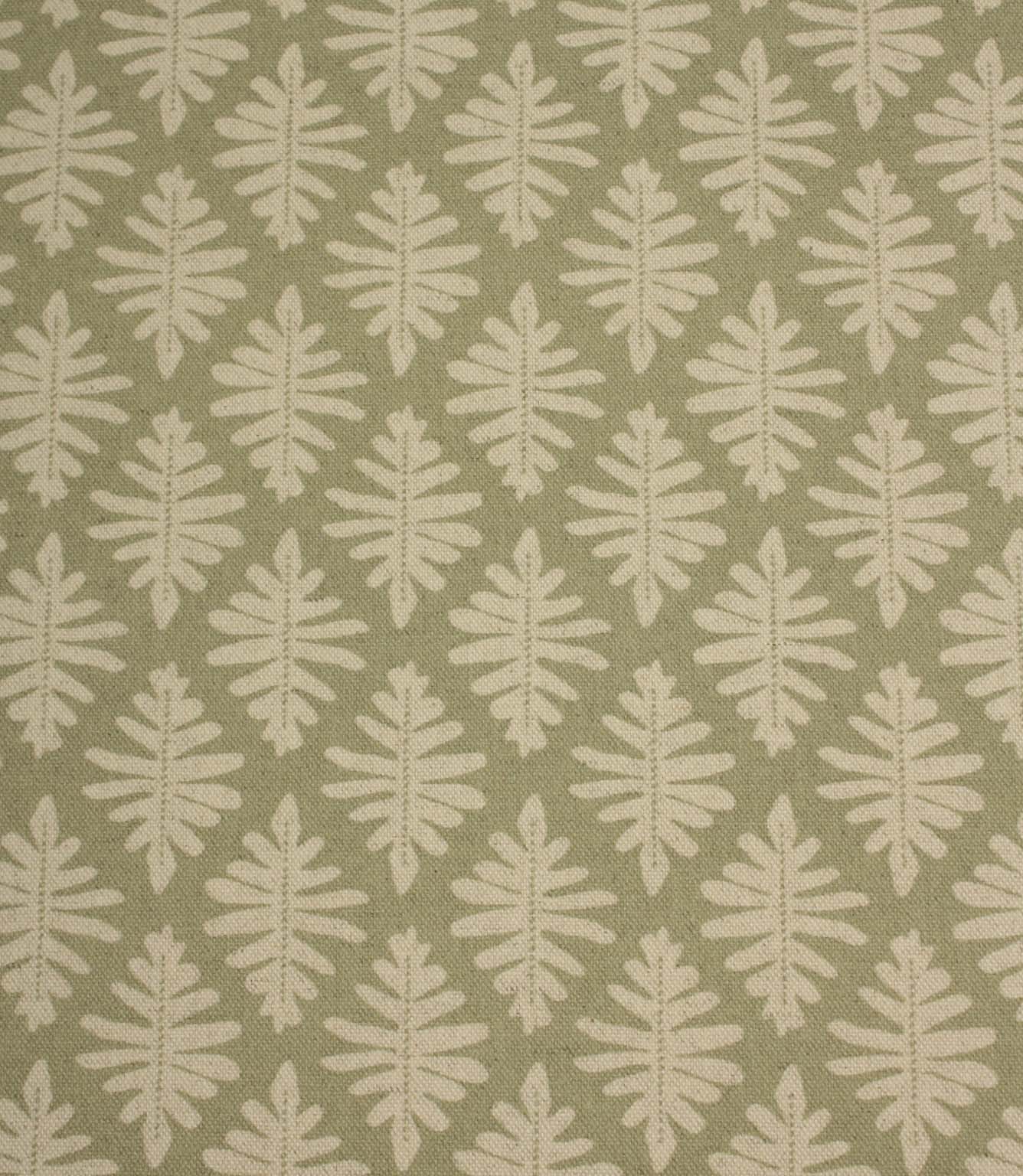 Close-up of Ashleaf Lemon Grass fabric showcasing the woven texture and contemporary leaf motif.