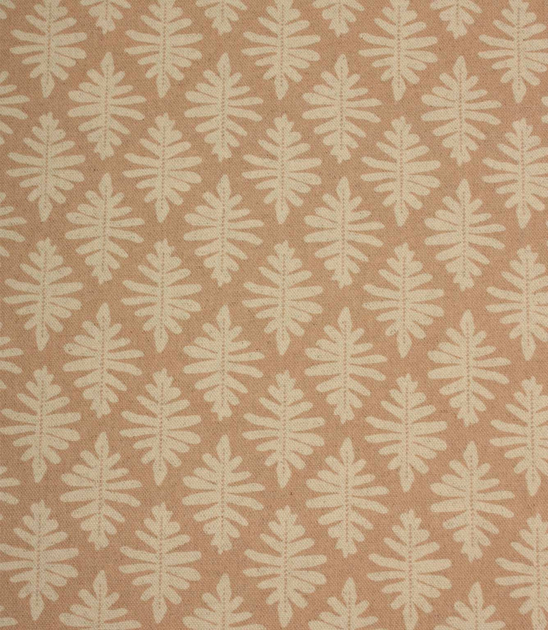 Close-up of Ashleaf Tuskan Pink woven fabric showcasing the textured finish and stylised botanical leaf pattern.