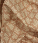 Draped Ashleaf Tuskan Pink fabric showing the natural handle, movement and repeating foliage motif.