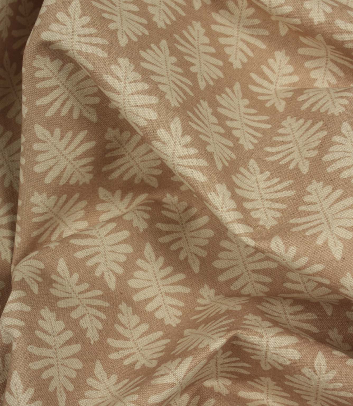 Draped Ashleaf Tuskan Pink fabric showing the natural handle, movement and repeating foliage motif.