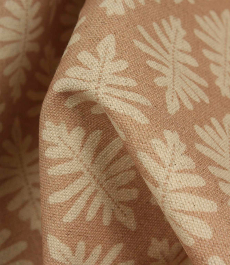Detailed close-up of Ashleaf Tuskan Pink fabric emphasising the woven construction, texture and cream leaf pattern.