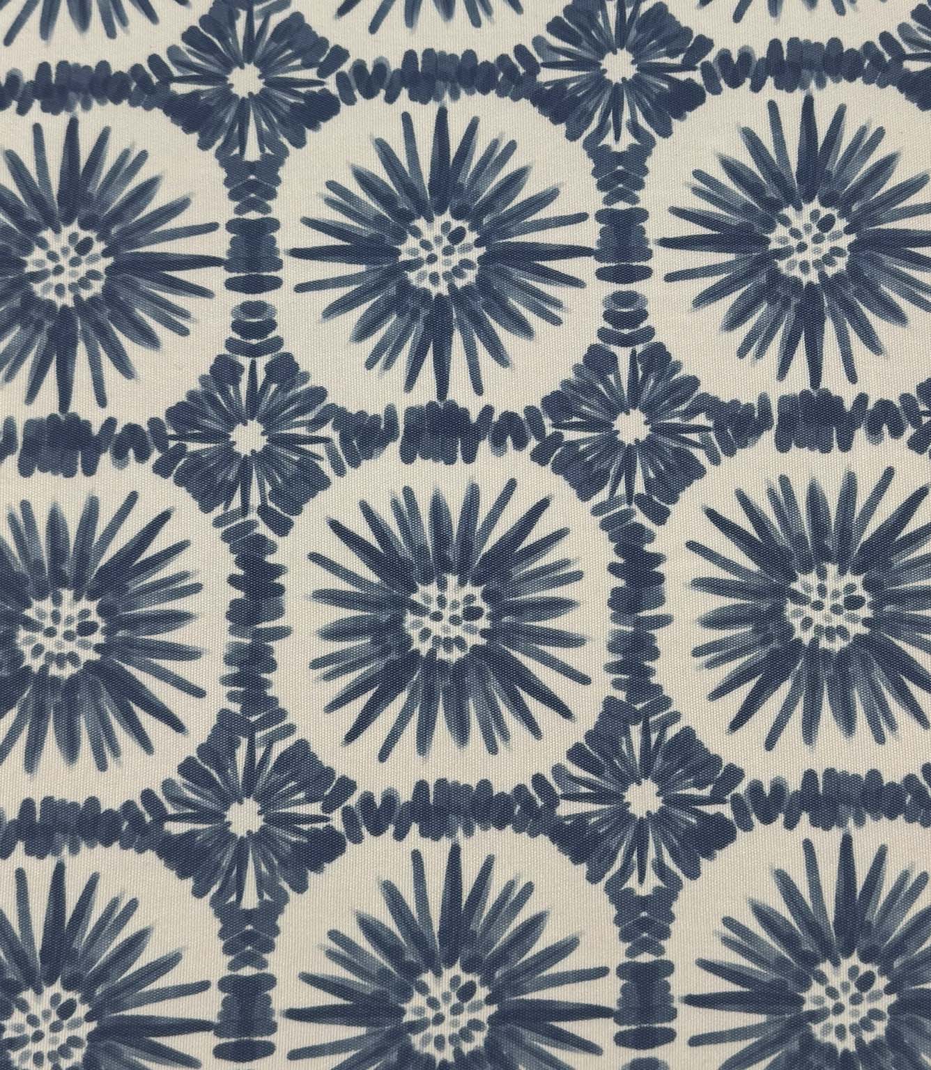Full repeat view of Atlantic Flower foliage outdoor fabric with indigo blue floral patterns arranged in a structured geometric layout on a cream backdrop.