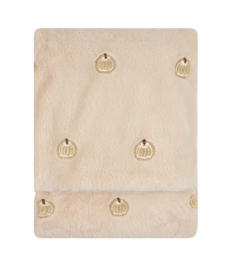 Folded natural cream Autumn Pumpkins faux fur throw with a soft plush texture and scattered beige, white and brown embroidered pumpkin motifs.