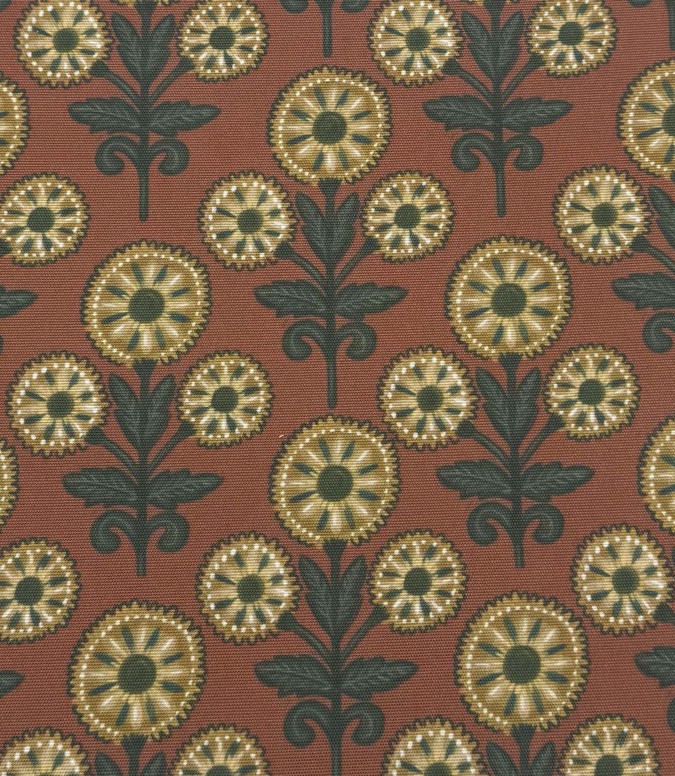 Full repeat view of Autumn Sunflower outdoor upholstery fabric with stylised floral patterns in mustard yellow, deep green, and burnt orange tones.