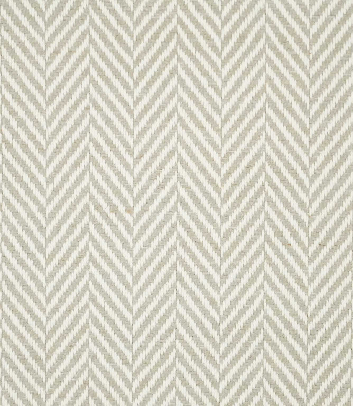 Bampton Argent herringbone fabric close-up, showing a soft grey-beige and off-white woven chevron pattern with clearly visible yarn texture.