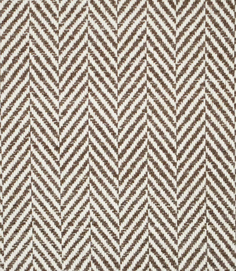 Bampton Bison herringbone fabric close-up, showing the textured chocolate brown and off-white woven chevron pattern with clearly visible yarn detail.