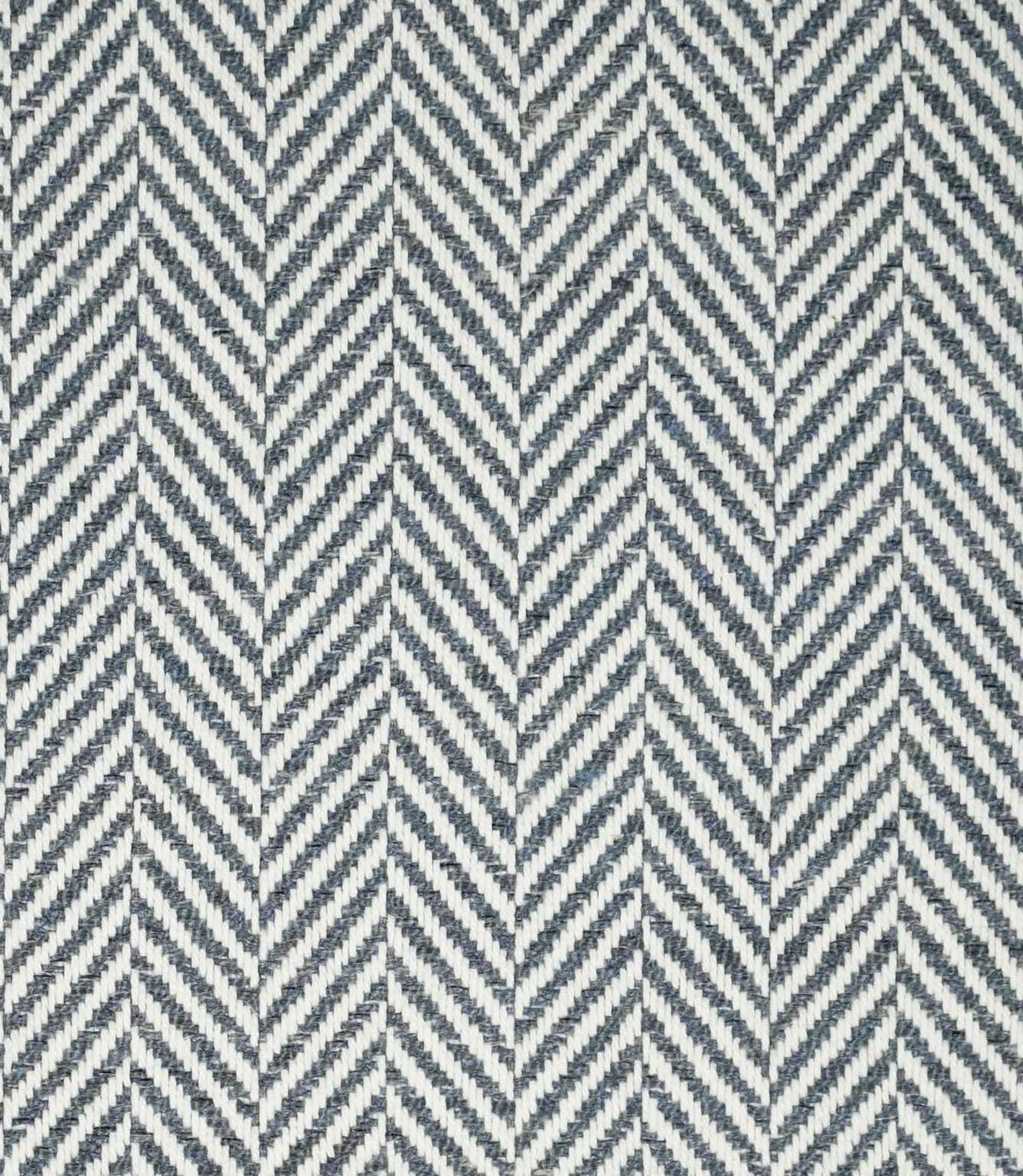 Bampton Ink herringbone fabric close-up, showing a dark navy blue and off-white woven chevron pattern with a clearly defined textured finish.