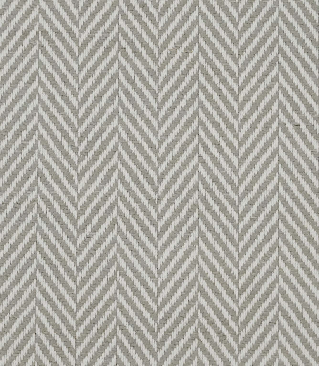 Close-up of Bampton Argent woven upholstery fabric showcasing the textured herringbone chevron weave in soft argent grey and ivory with a premium finish.