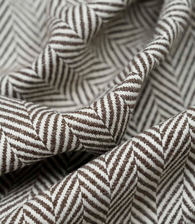 Close-up detail of Bampton Bison upholstery fabric highlighting the woven herringbone texture, fabric construction and premium quality finish.