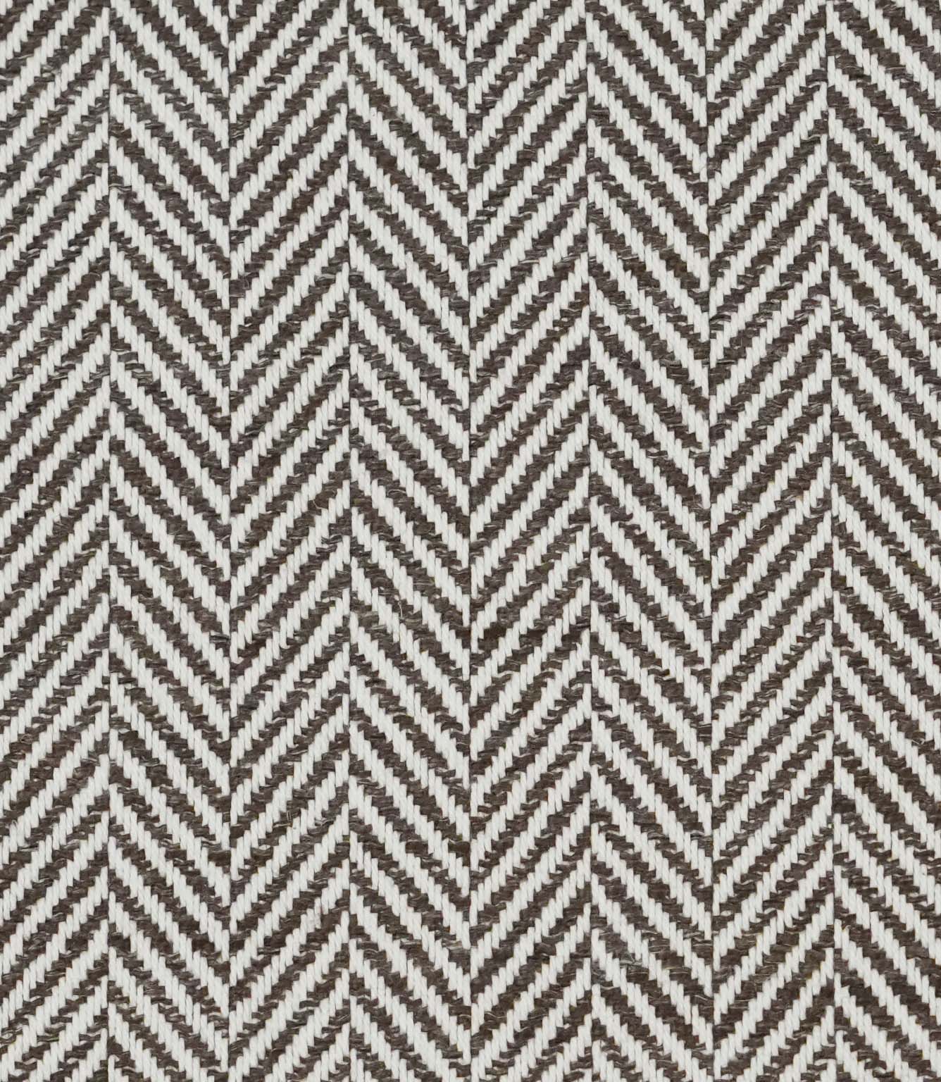 Close-up of Bampton Bison upholstery fabric highlighting the textured woven herringbone design and premium finish in brown and ivory.