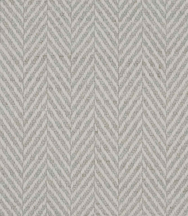 Close-up of Bampton Elephant Grey woven herringbone upholstery fabric featuring a classic chevron pattern in soft elephant grey and ivory with a textured finish.