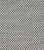 Close-up of Bampton Ink woven herringbone upholstery fabric featuring a classic chevron pattern in deep ink blue and ivory with a textured finish.