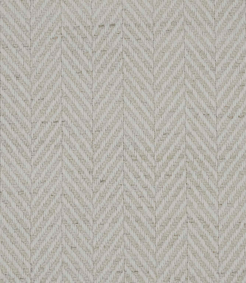 Close-up of Bampton Jasmine woven herringbone upholstery fabric showing the detailed textured weave.