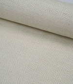Wide view of Bampton Jasmine woven herringbone fabric showcasing the continuous classic pattern.